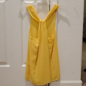 Yellow sleeveless top